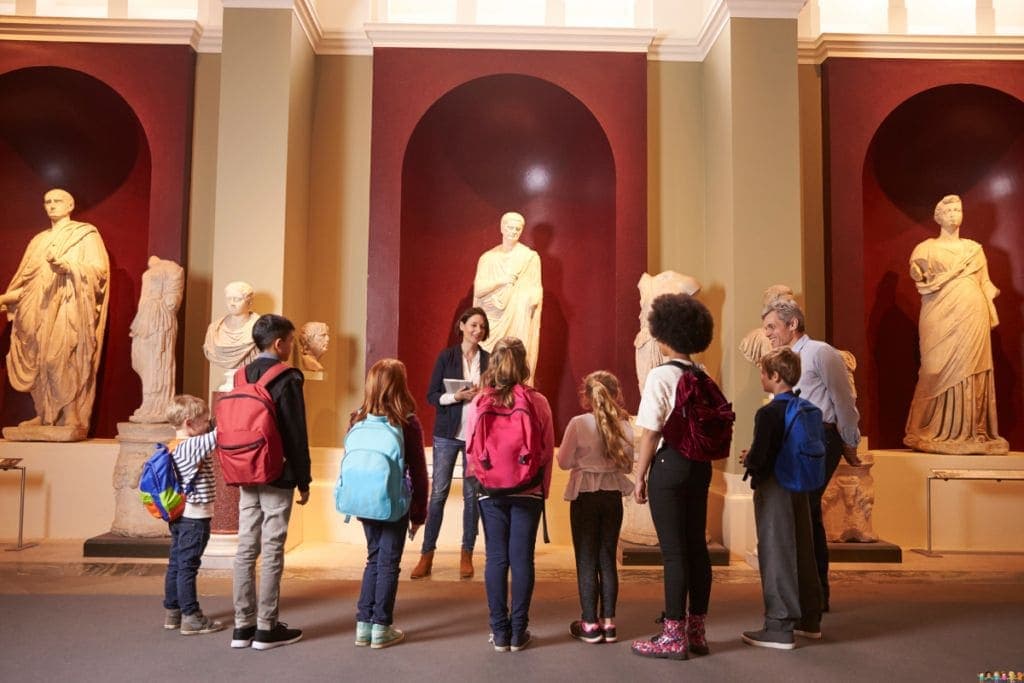 A group of happy students on a school trip.